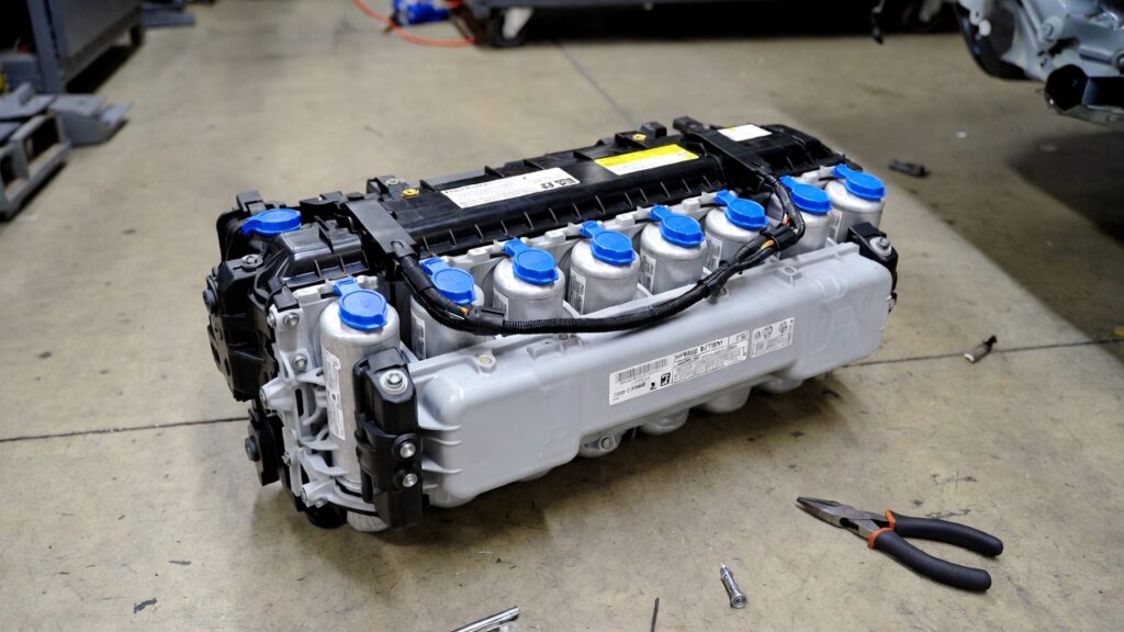 2009 Toyota Camry Hybrid battery replacement pack in workshop