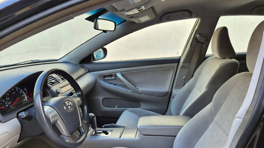 2009 Toyota Camry Hybrid interior dashboard and front seats