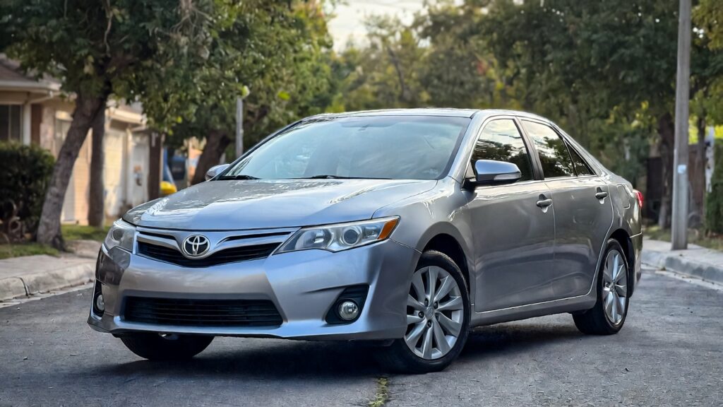 2011 Toyota Camry XLE sedan exterior on suburban street