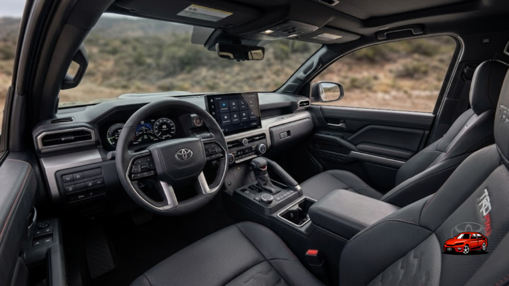 Premium 2026 Toyota Tacoma interior with 14-inch touchscreen and digital gauge cluster.